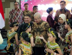 Sekda Harisson Sebut Keluarga Harmonis Kunci Pembangunan Daerah di Perayaan Natal DWP Kalbar