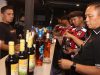 Ratusan Botol Miras Kadar Alkohol Tinggi Disembunyikan di Balik Ruang Karaoke Disita
