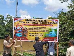 Polsek Sandai dan Pemdes Penjawaan Pasang Larangan PETI di Sungai Pawan